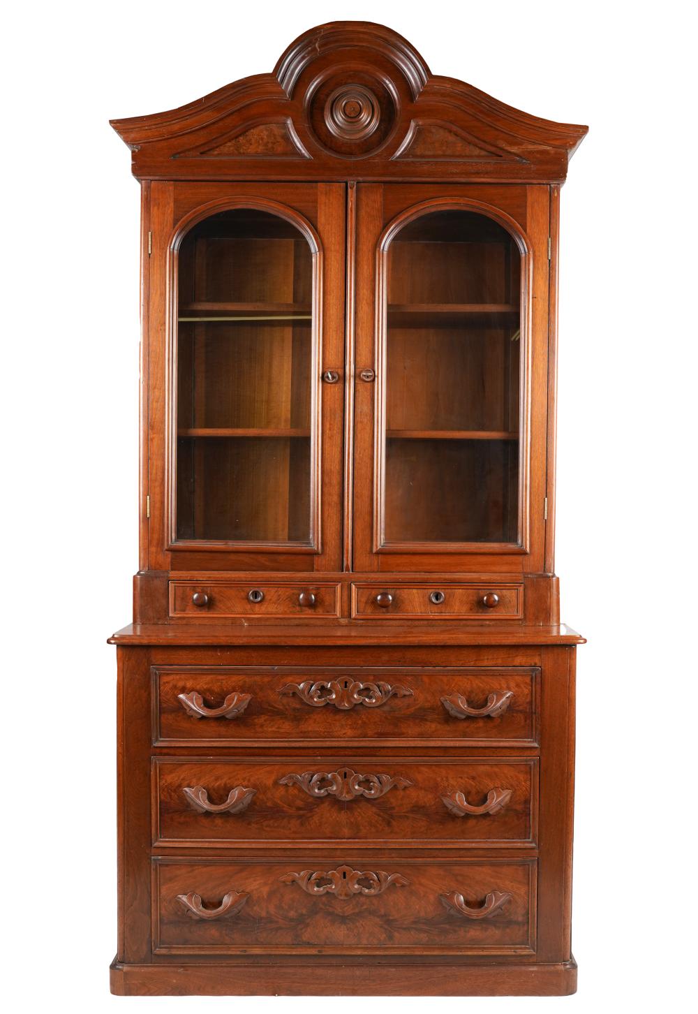 Appraisal: AMERICAN RENAISSANCE REVIVAL-STYLE BOOKCASE CABINETin two parts the upper section