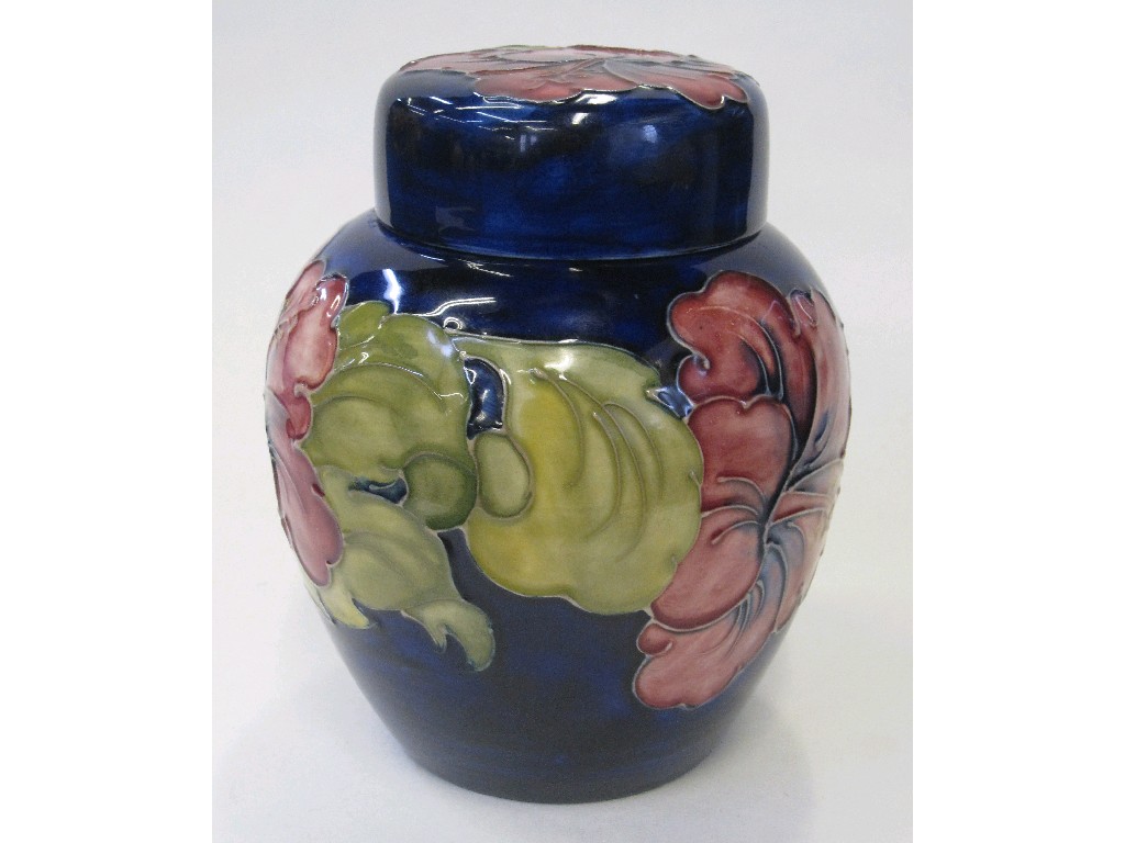 Appraisal: Moorcroft Hibiscus ginger jar and lid with blue ground impressed