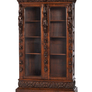 Appraisal: A Renaissance Revival Carved Oak Display Cabinet th Century Height