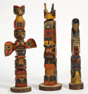 Appraisal: lot of Northwest Coast totem poles lot of Northwest Coast