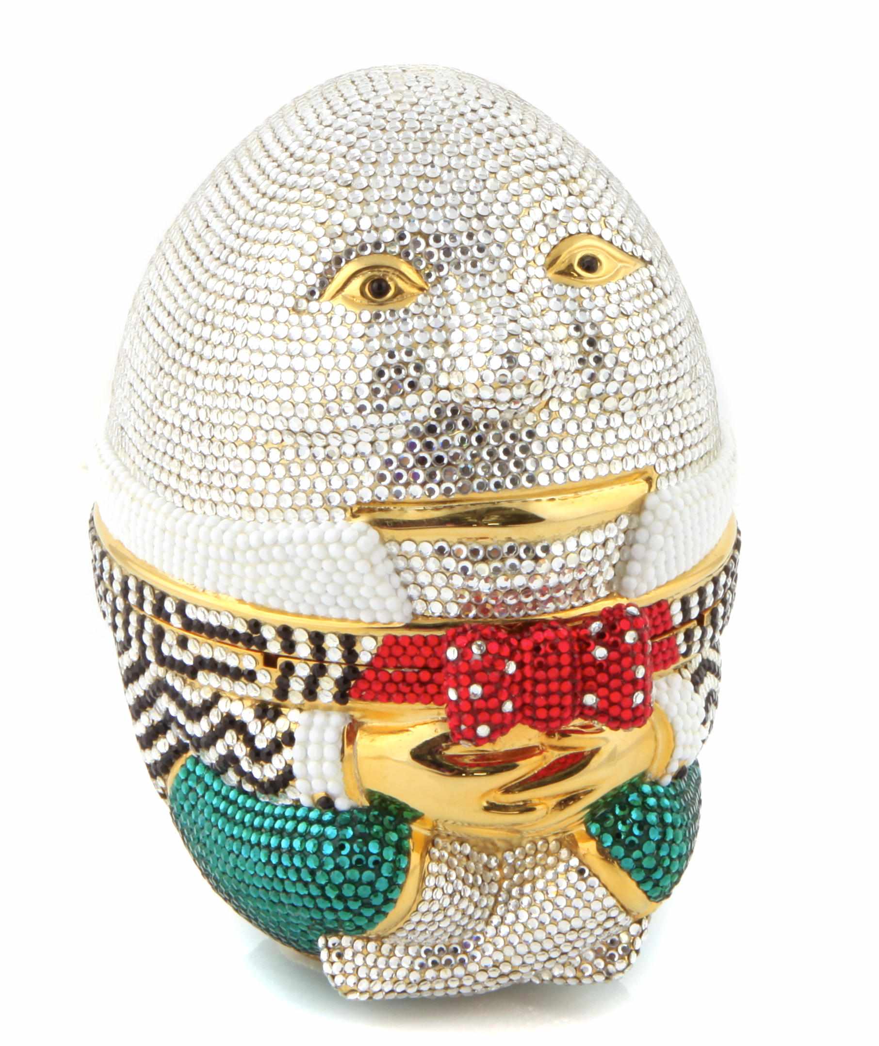 Appraisal: A multi-colored crystal humpty dumpty minaudiere accompanied with a signed