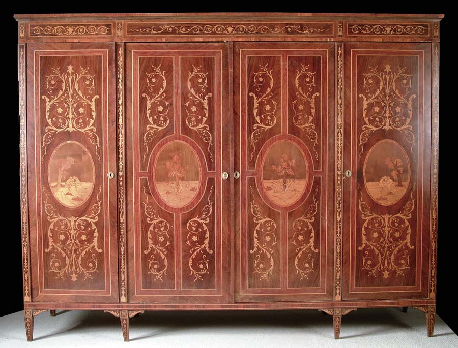 Appraisal: OUTSTANDING INLAID ANTIQUE WARDROBE This knock down wardrobe has four