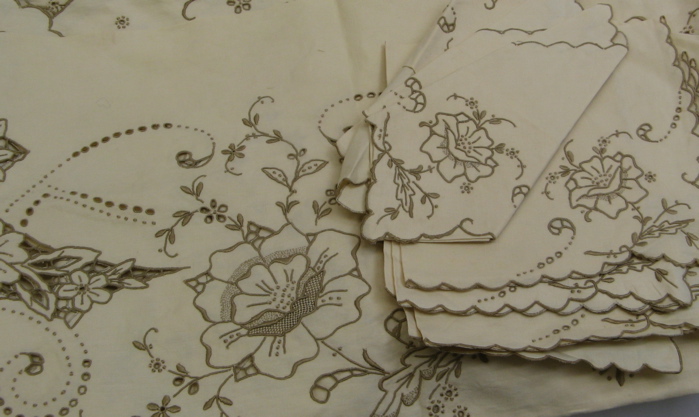 Appraisal: IRISH LINEN BANQUET TABLECLOTH NAPKINS The tablecloth beautifully embroidered and