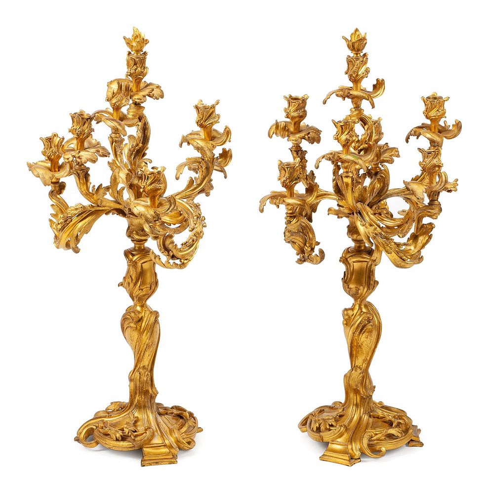 Appraisal: A Pair of Louis XV Style Gilt Bronze Seven-Light Candelabra