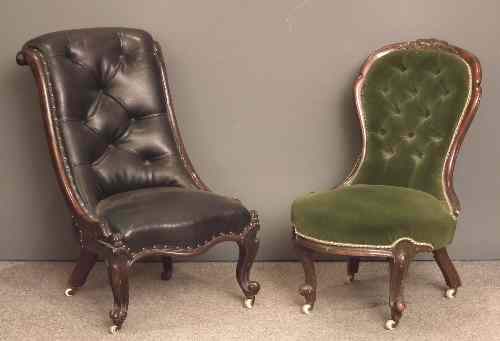 Appraisal: A Victorian rosewood framed scroll back nursing chair upholstered in