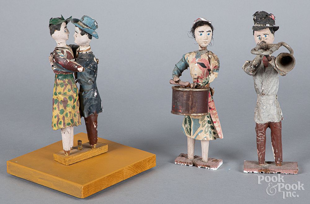 Appraisal: Three wood and papier m ch folk art figures Three