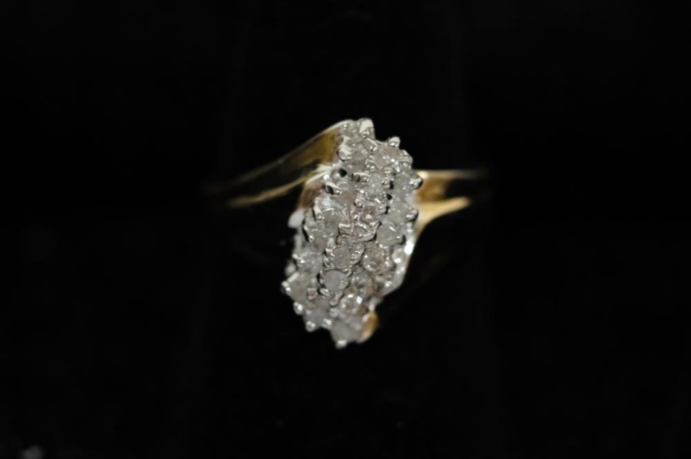 Appraisal: K YG WHITE DIAMOND RING SZ k Yellow gold CTTW