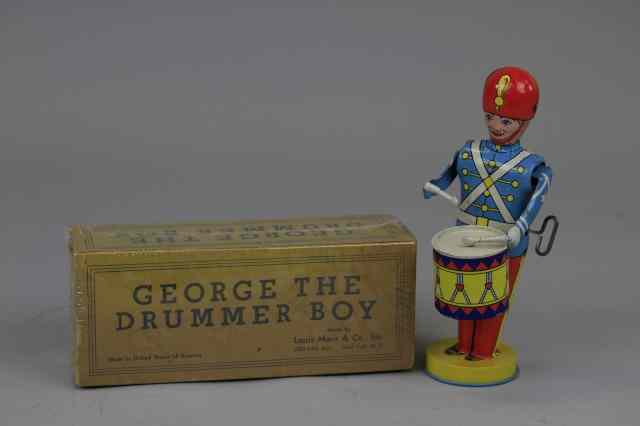 Appraisal: GEORGE THE DRUMMER BOY IN ORIGINAL BOX Marx litho tin