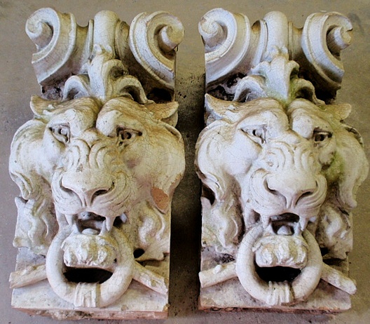 Appraisal: - Pair of large glazed terracotta lion head mask corbels