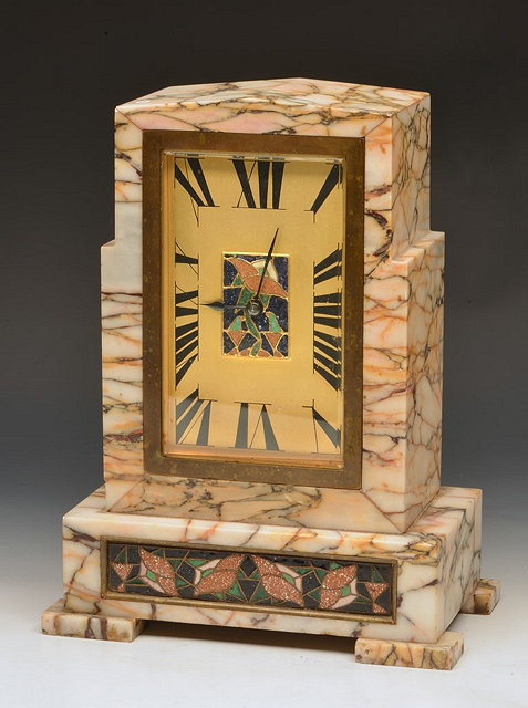 Appraisal: AN ART DECO MARBLE MANTEL CLOCK with rectangular dial having