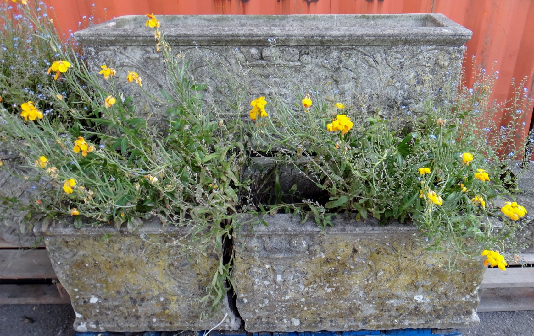 Appraisal: A set of three reconstituted stone rectangular planters relief moulded