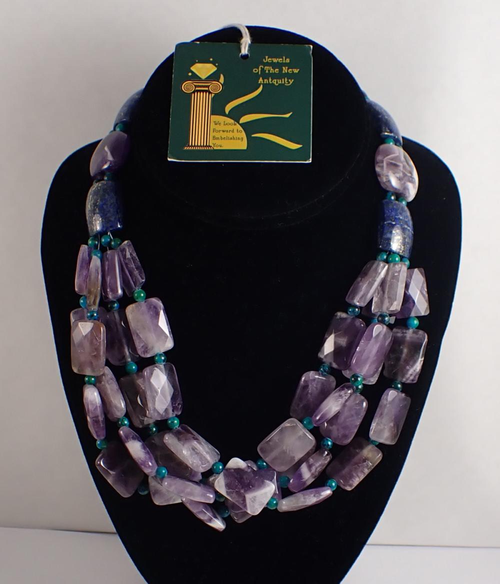 Appraisal: FOUR-STRAND AMETHYST TURQUOISE AND LAPIS NECKLACE strung with chevron amethyst