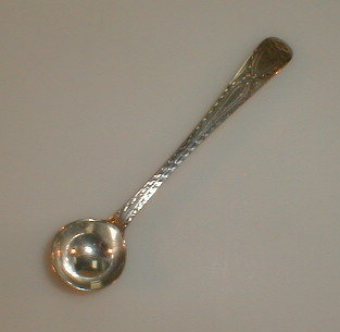 Appraisal: A George III silver mustard spoon with bright cut decoration