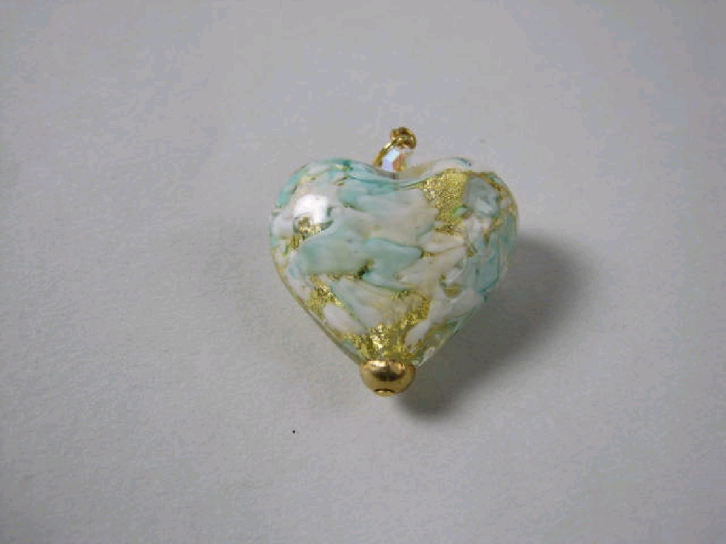 Appraisal: A Murano glass Heart shaped Pendant with gold mounts