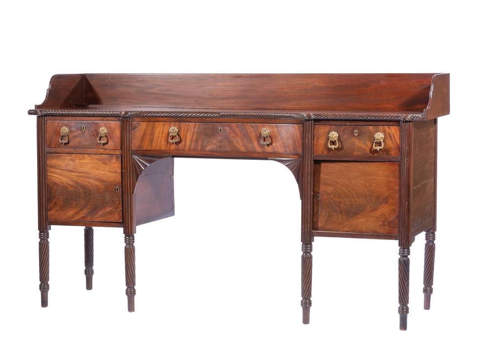 Appraisal: Regency Carved Mahogany Sideboard th c shaped backsplash shaped top