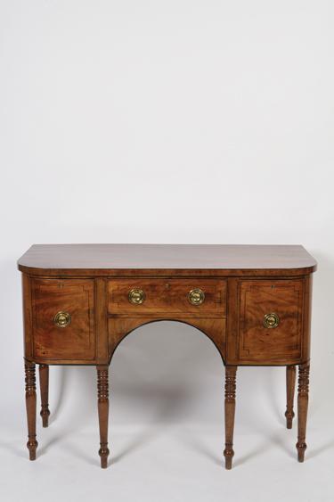 Appraisal: A GEORGE III MAHOGANY SIDEBOARD with a rectangular top with