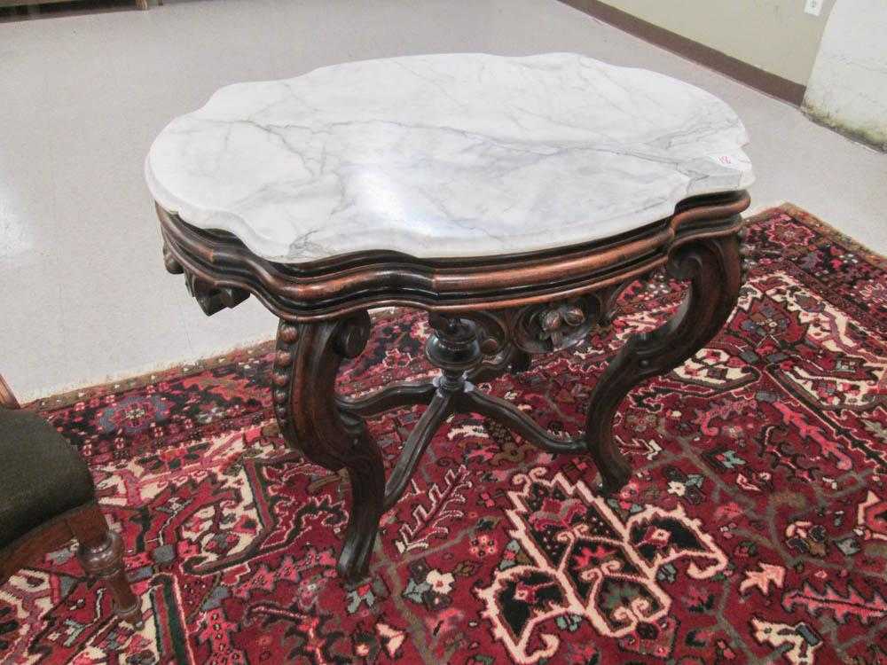 Appraisal: VICTORIAN MARBLE-TOP WALNUT LAMP TABLE Rococo Revival American last quarter