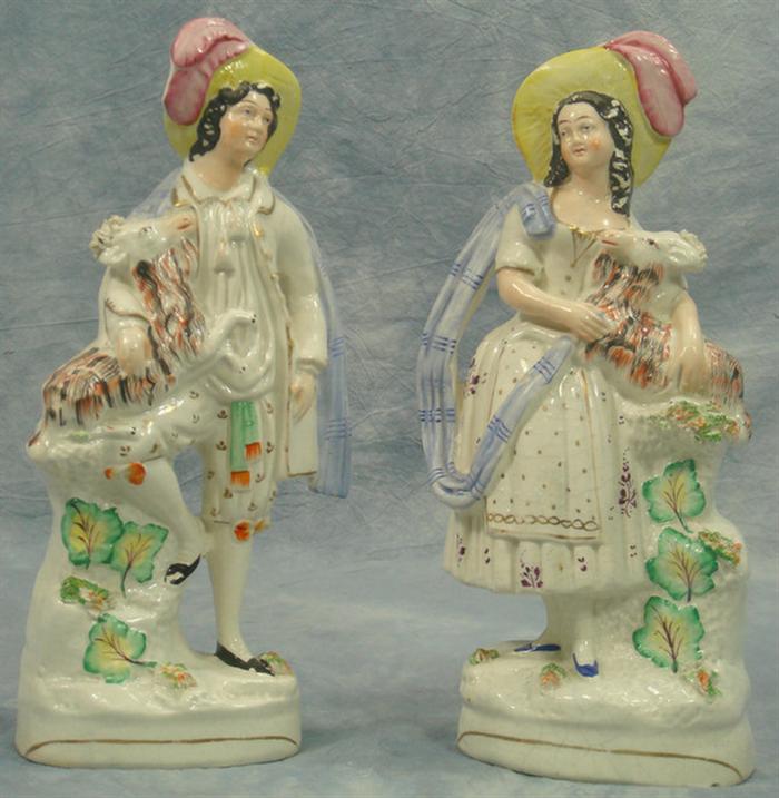 Appraisal: Pr Staffordshire figurines fancy couple with Welsh goats h glaze