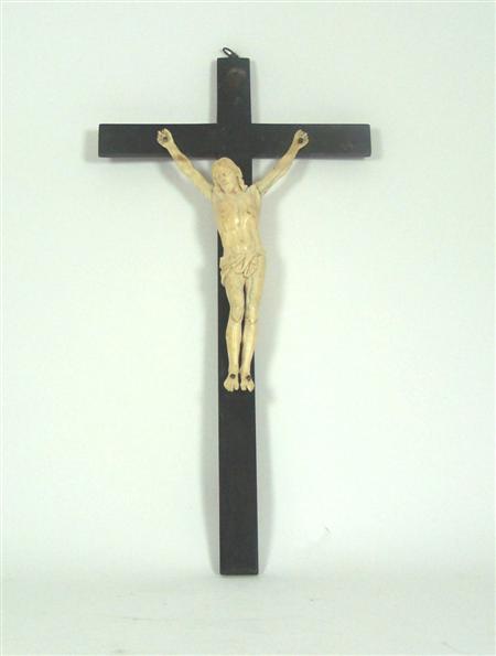 Appraisal: A th century crucifix the ivory corpus with loosely draped