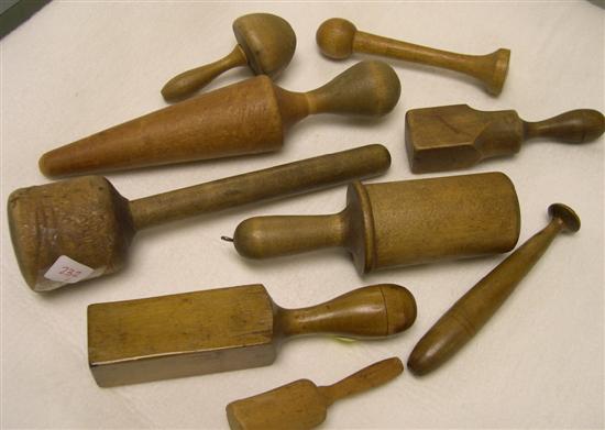 Appraisal: Collection of nine th C wooden mashers various shapes the