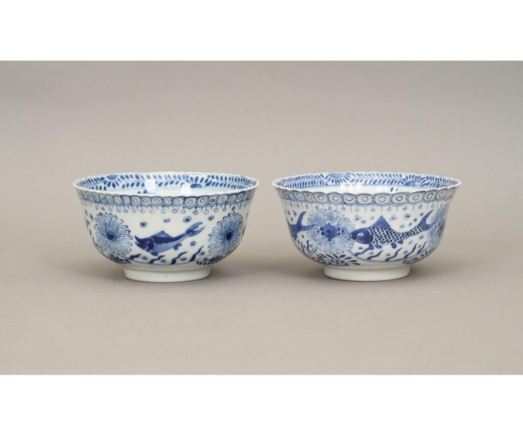 Appraisal: Two similar Chinese porcelain bowls decorated with fish and flowers