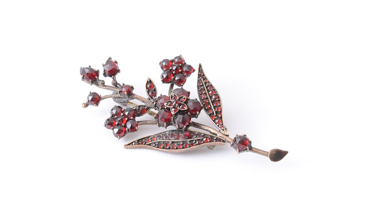 Appraisal: VICTORIAN GARNET FLORAL SPRAY PIN Pin in the form of