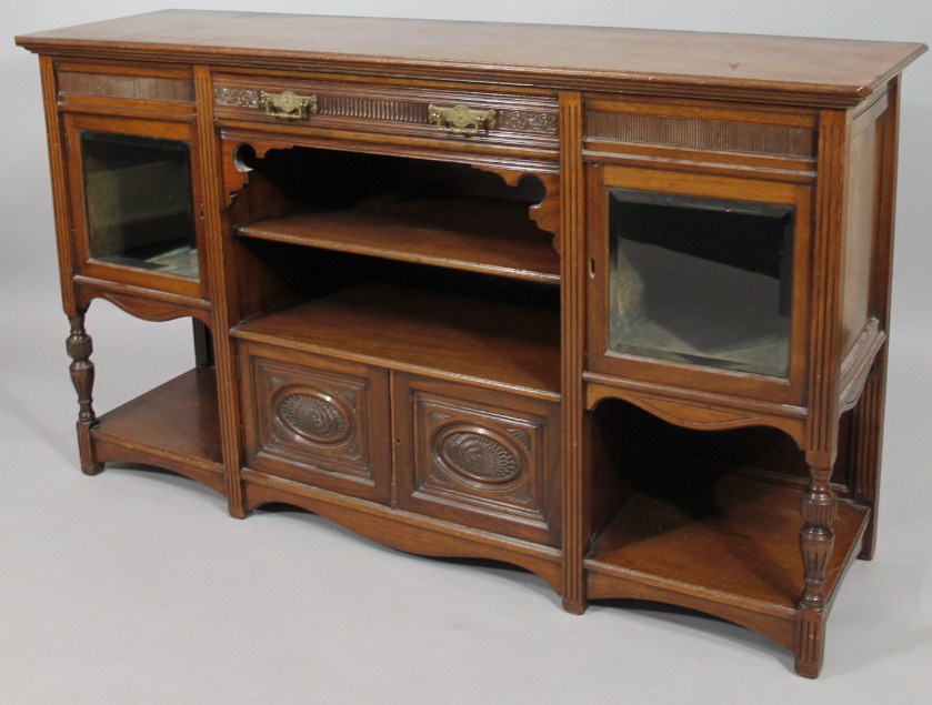 Appraisal: A late Victorian walnut combination side cabinet