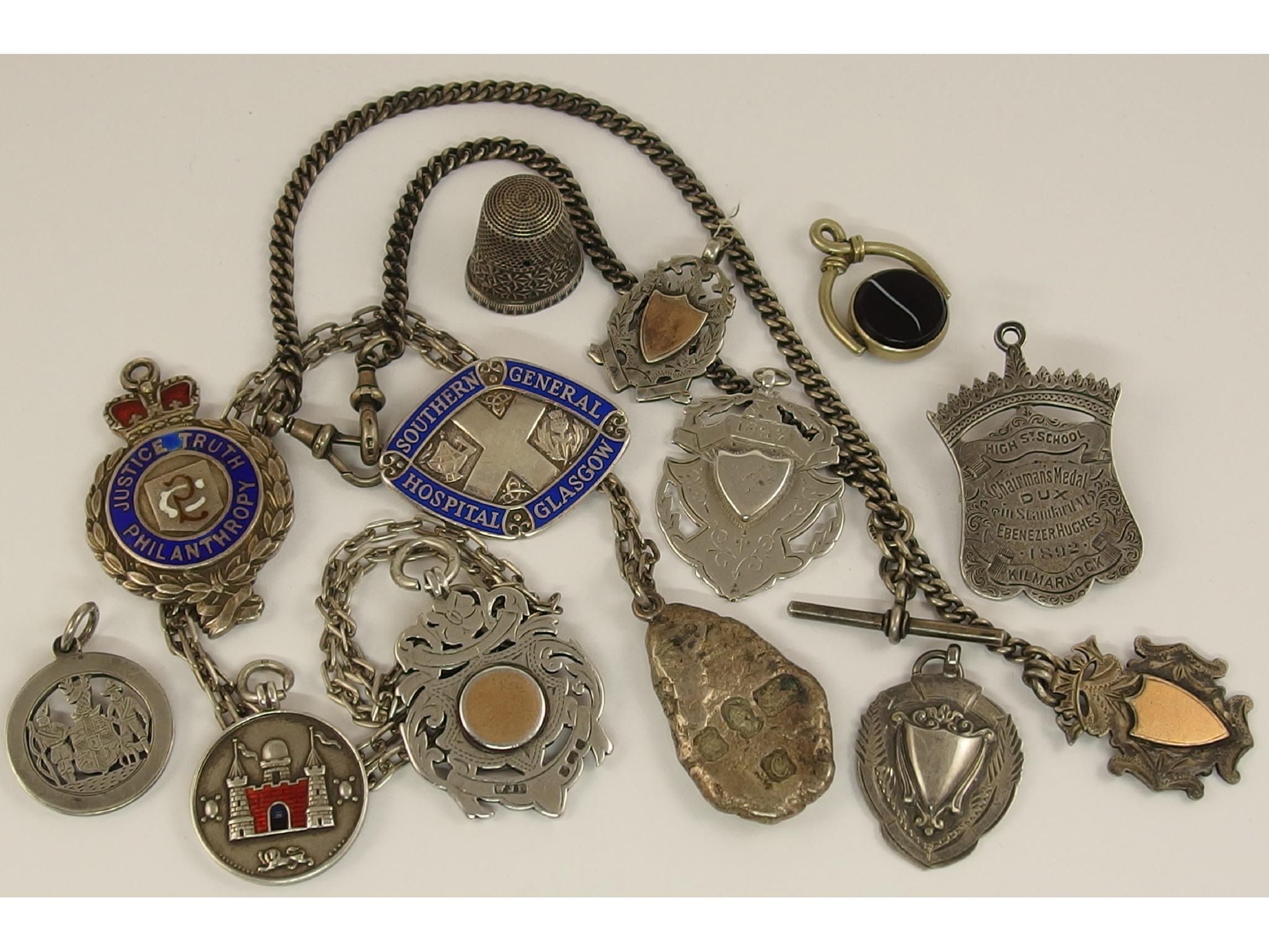 Appraisal: A collection of silver and white metal medallions and badges