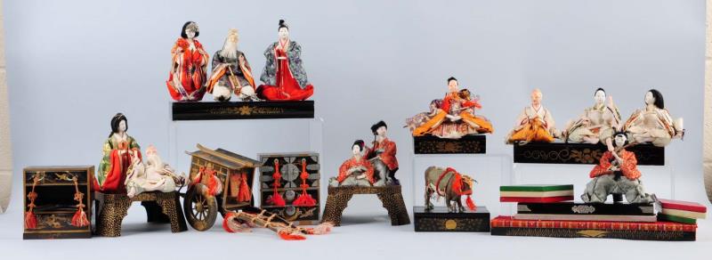 Appraisal: Large Lot Of Asian Dolls And Accessories This lot includes