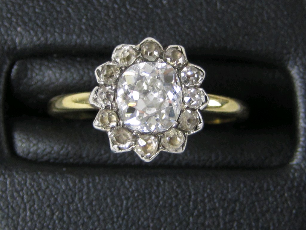 Appraisal: A Georgian Diamond Cluster Ring close-set central old-cut stone approx