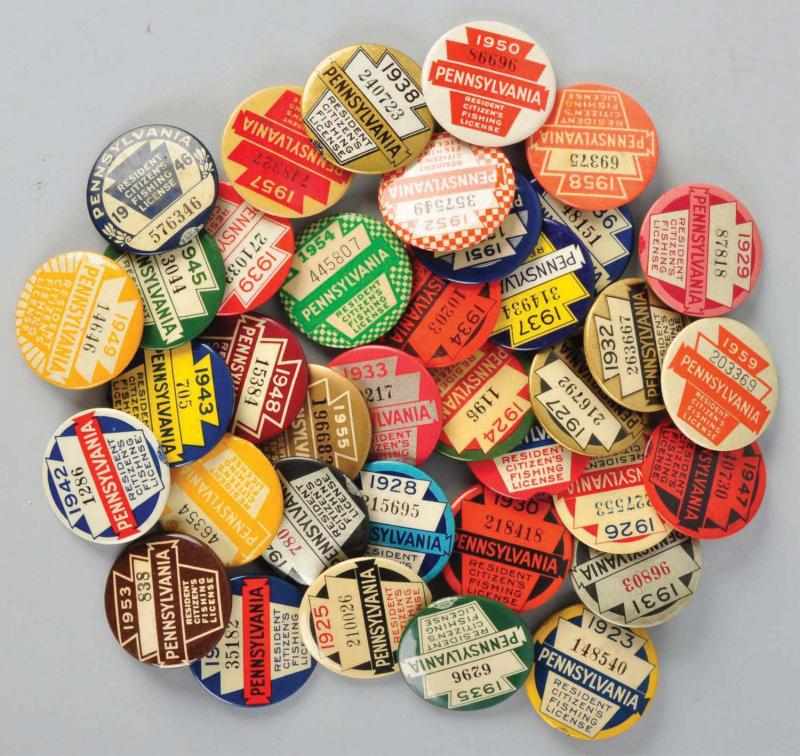 Appraisal: Large Lot of PA Fishing Licenses Description Celluloid pin backs