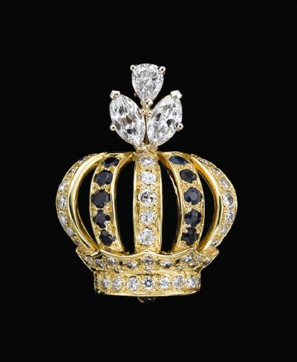 Appraisal: Yellow gold diamond and sapphire crown pin th century Set