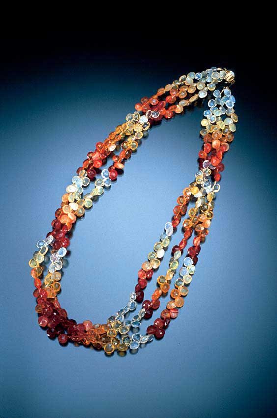 Appraisal: FIRE OPAL NECKLACE Mexico Three strands of facetted teardrop fire