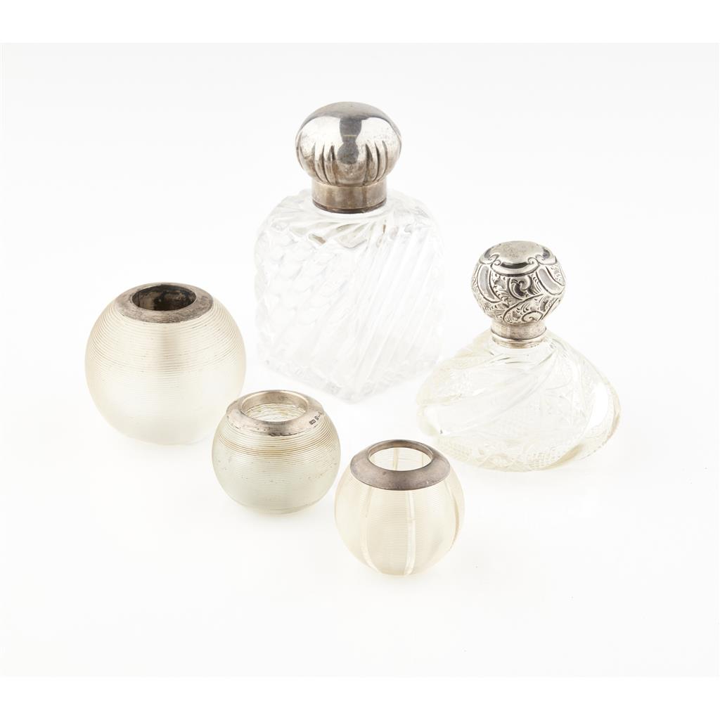 Appraisal: A group of silver mounted glassware comprising two large scent