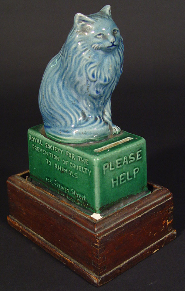 Appraisal: Watcombe RSPCA advertising pottery money bank modelled as a cat