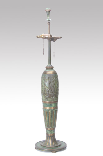 Appraisal: OSCAR BACH Bronze table lamp base decorated with a hunting