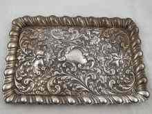 Appraisal: An ornate silver tray with gadrooned edge and grotesque masks