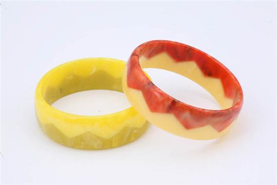 Appraisal: TWO BAKELITE BRACELETS Both have mottled two-color zig zag design