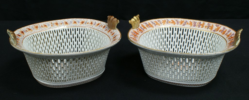 Appraisal: Pair of Chinese Export Porcelain Reticulated Chestnut Baskets with Undertrays