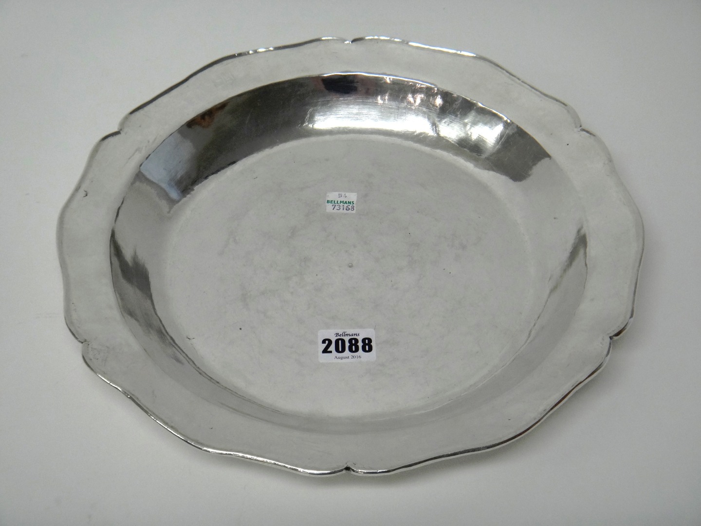 Appraisal: A South American shaped circular shallow basin the underside of