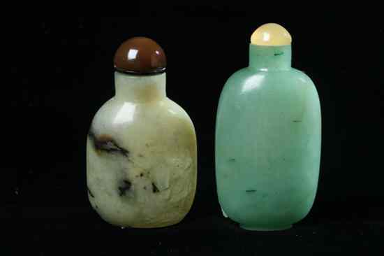 Appraisal: TWO CHINESE GREEN JADE SNUFF BOTTLES Flattened ovoid-form very well