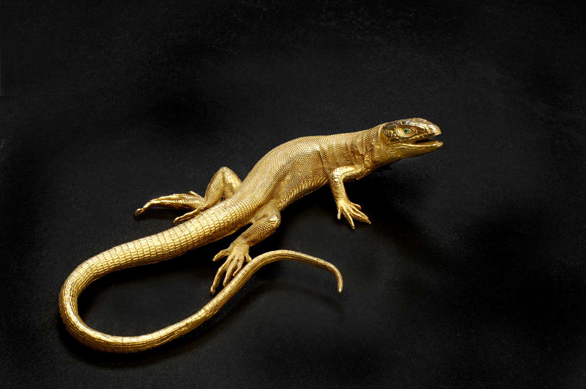 Appraisal: CONTINENTAL GILT-BRONZE FIGURE OF A LIZARD Modeled in a defensive