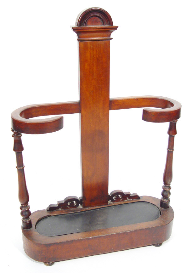 Appraisal: Victorian mahogany hallstand with turned supports and metal tray liner