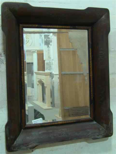 Appraisal: CHINOISERIE STYLE DARK BROWN WOODEN MIRROR of shaped rectangular form