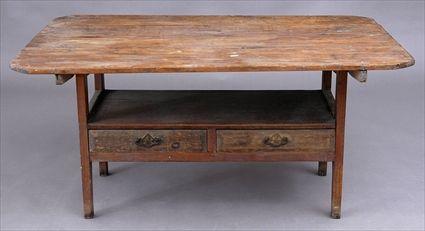 Appraisal: STAINED PINE SETTEE TABLE The -plank top with round corners