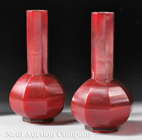 Appraisal: A Pair of Chinese Red Beijing Glass Faceted Bottle Vases