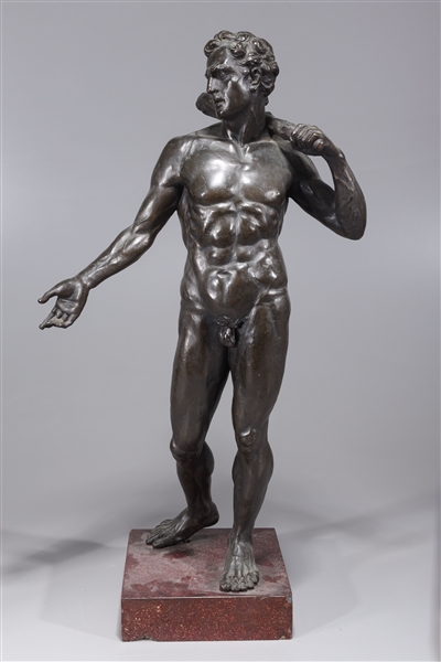 Appraisal: Bronze standing nude figure of a male holding a club