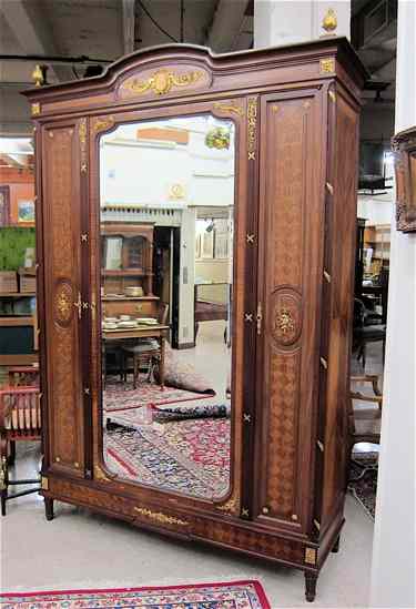 Appraisal: LOUIS XVI STYLE ORMOLU-MOUNTED MAHOGANY ARMOIRE French c centering a