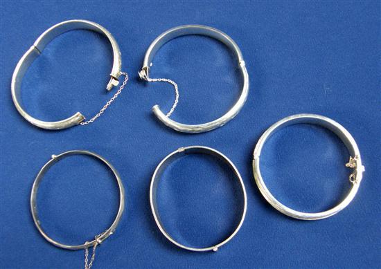 Appraisal: Five silver hinged bracelets various dates and makers oz