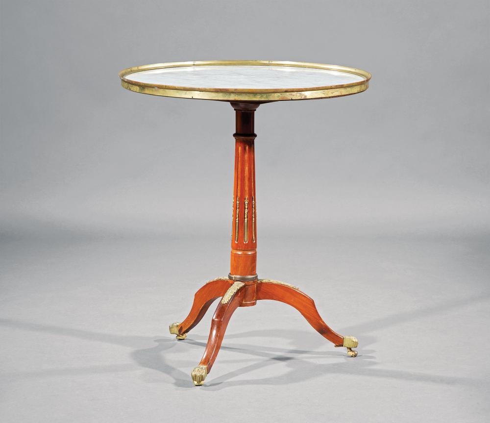 Appraisal: French Bronze-Mounted Mahogany Side Table inset marble top fluted standard